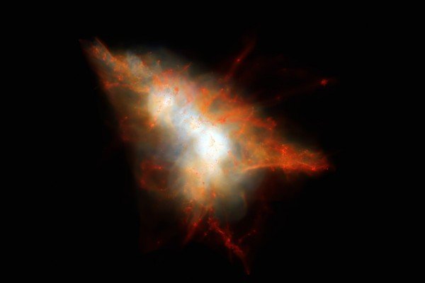 Космическое облако газа подсвечивают две молодые галактики