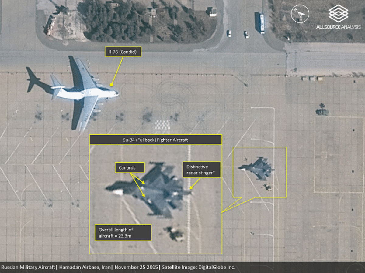 Российские военные самолеты на базе Хамадан в Иране в августе 2016 г. Слева транспортный Ил-76, внизу кадра в центре – фронтовой бомбардировщик Су-34, справа – многоцелевой истребитель Су-30СМ