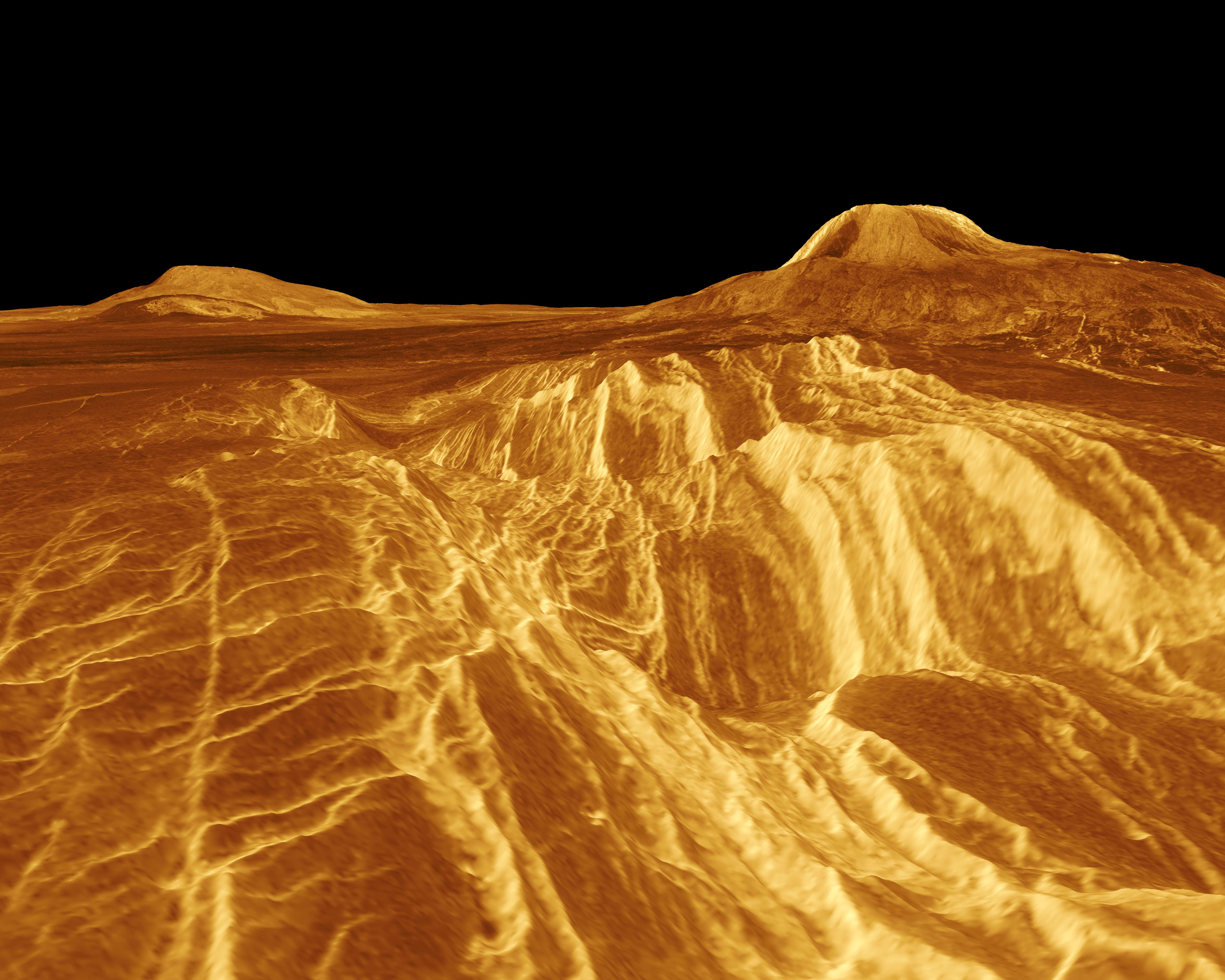 Компьютерная реконструкция плато Elista Regio на Венере – справа вулкан Gula Mons высотой 3000 м. Рисунок показывает, как тяжело придется работать на планете, где температуры выше земных в 20 раз, а давление – в 90.